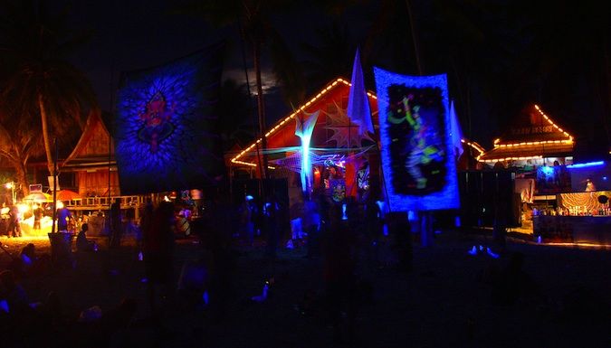 A move dancer on Haat Rin beach inwards thailand The Ultimate Guide to the Full Luna Party