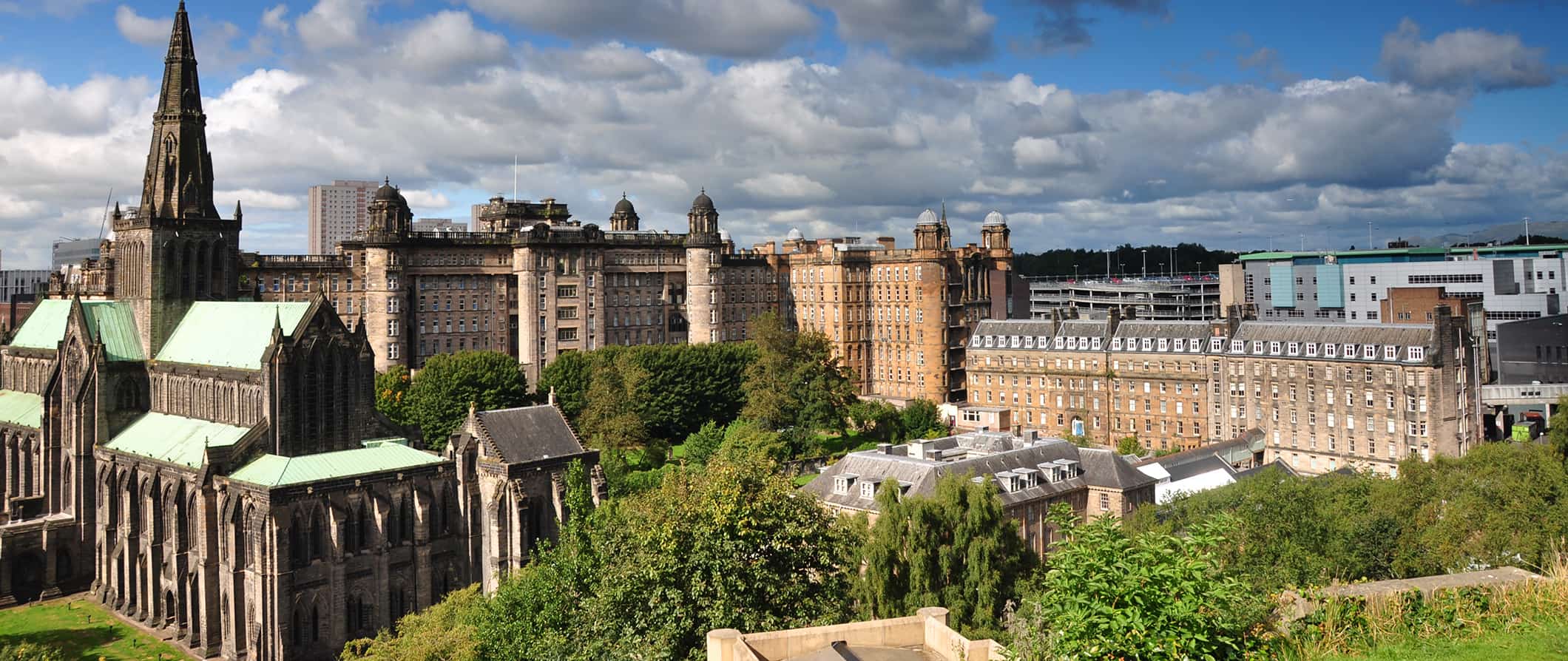 Historic buildings filling up the skyline in Glasgow, Scotland on a sunny summer day