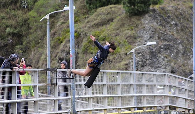 Heather bungy jumping off a bridge