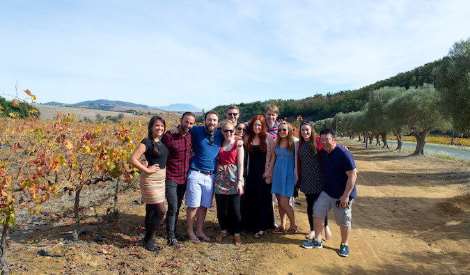 tour group posing for a photo while traveling