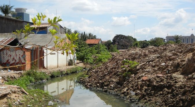 A small stream is all that is left of Beoung Kak Lake in Cambodia