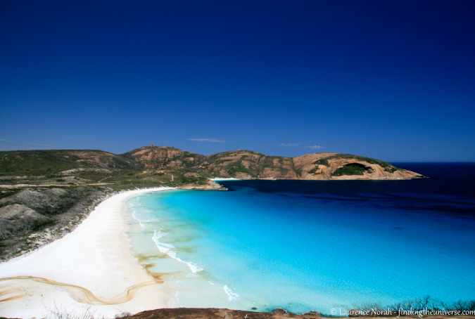 Blue skies and clear water at Hellfire Beach in Western Australia