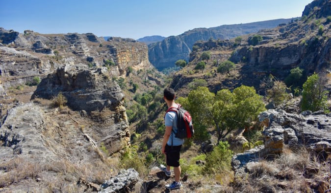 Nomadic Matt in Isalo National Park looking out over the valley and forests