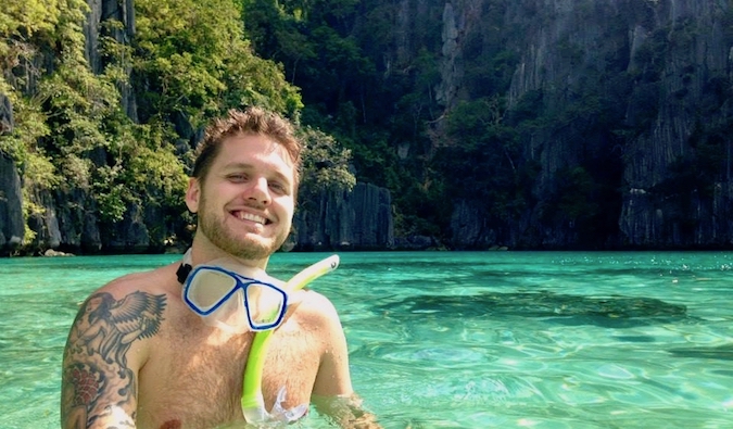 Mark Manson snorkeling in clear waters in South East Asia