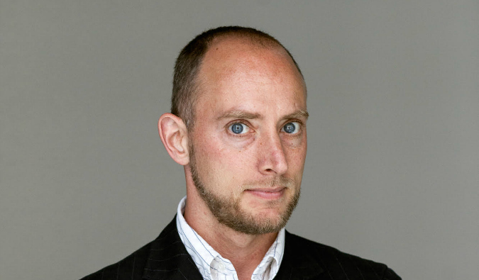 A headshot of author and writer Matt Gross