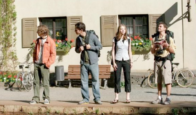 Backpackers on a European street in the movie Eurotrip