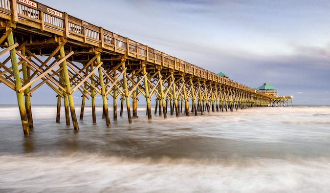 Folly beach pier sunset by Laurence Norah