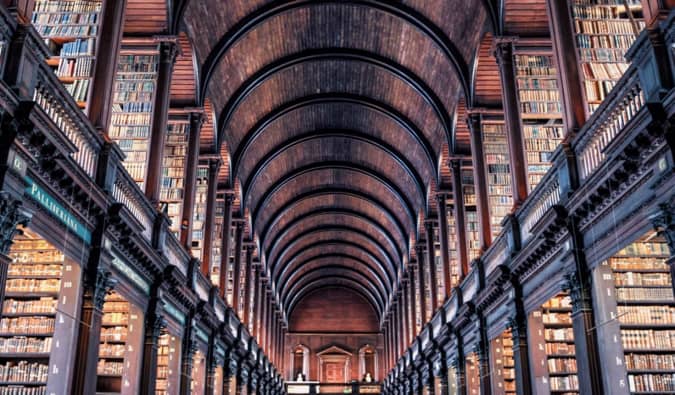 A massive and spacious historic library full of books