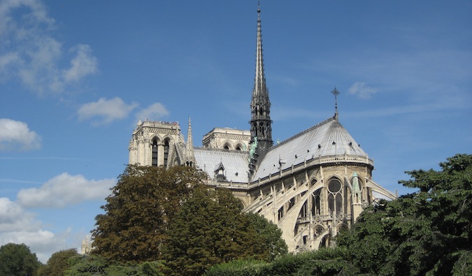 the back of the notre dame cathedral in Paris, France on a sunny day