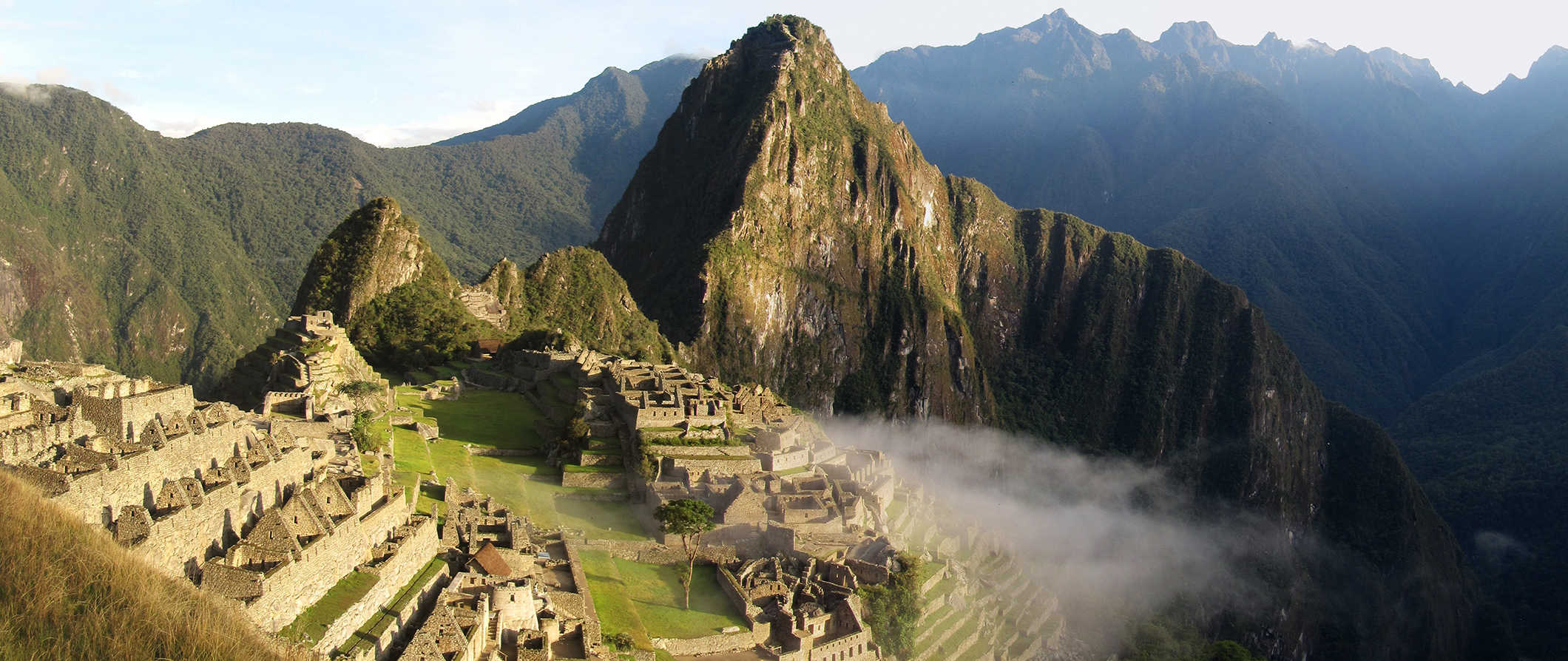 Machu Picchu, Peru with light fog flowing through the ruins