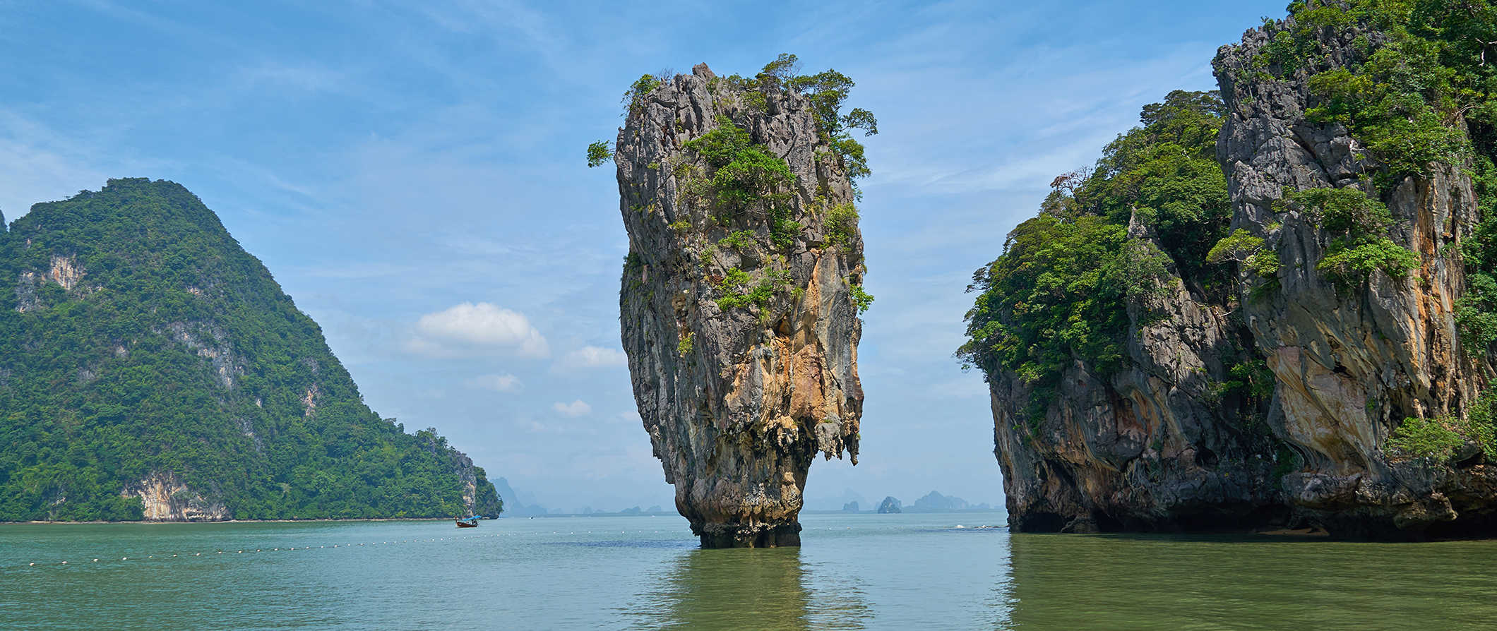 Iconic towering limestone formations over the water in Phuket, Thailand