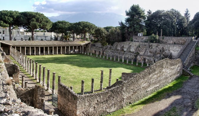 The ancient massive ruins of the Pompeii Palestra on a sunny day