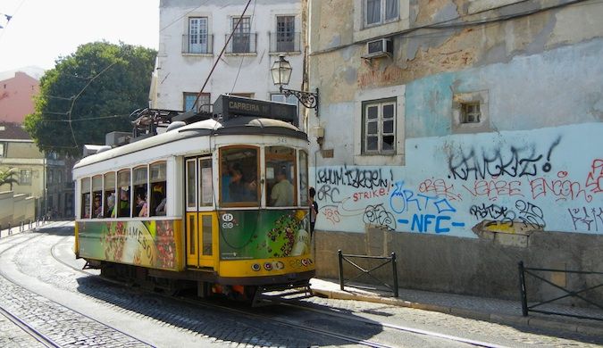cable car and cobblestone street in Lisbon