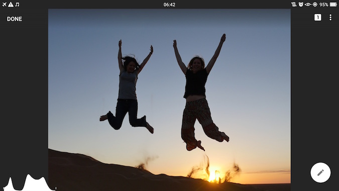 Girls jumping on sand dunes - original photo