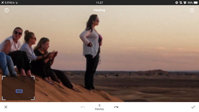 People sitting on a sand dune in Lightroom 2