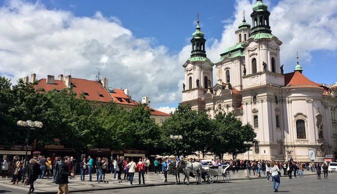 A towering historic church in Czechia looking pretty in the summer sun