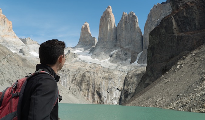 Nomadic Mattt looking at the beautiful scenery while hiking in Patagonia, Chile