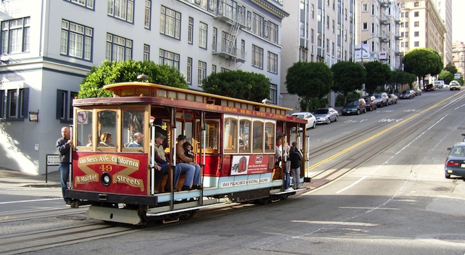 Traditional and iconic cable cars on beautiful street in California