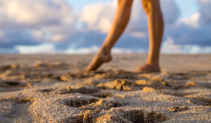 Woman walking on beach