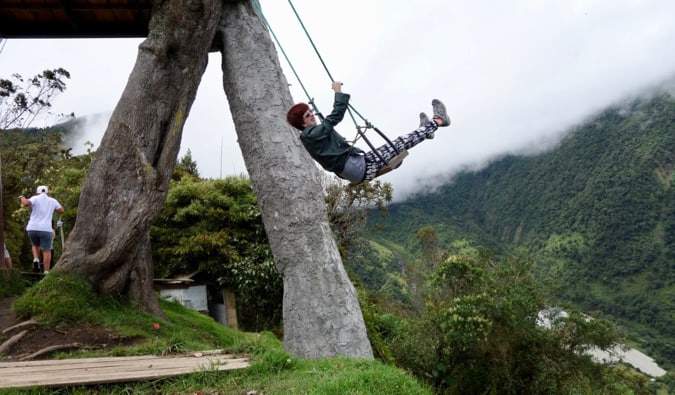 Staci swinging on a swing