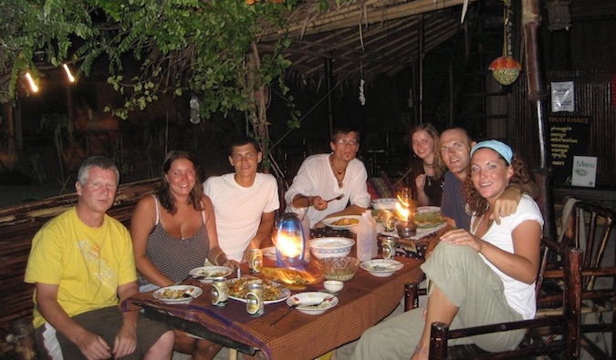 Nomadic Matt posing with his friends on Ko Lipe, Thailand