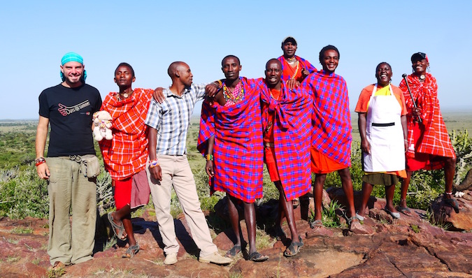 traveller with the Massai people in Kenya