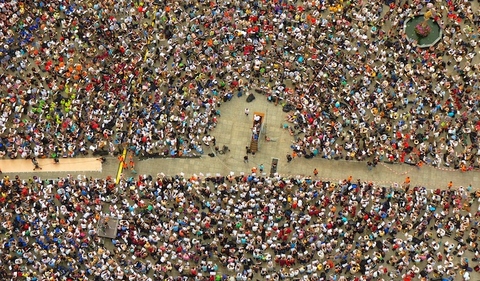 A travel related protest with a massive crowd of people