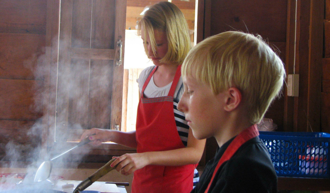 The children from The Wide Wide World Family taking a cooking class