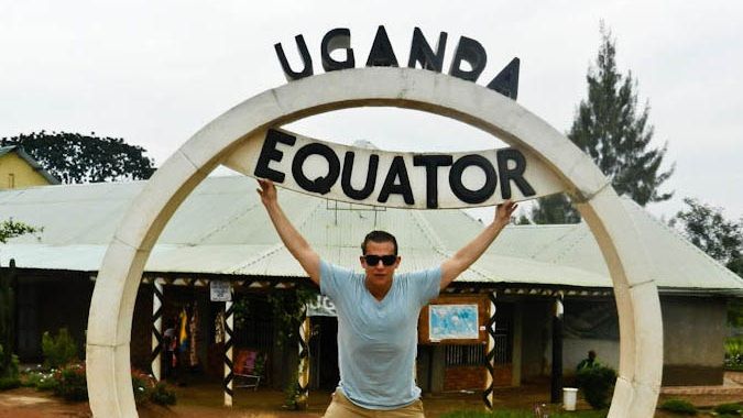 Standing at the equator in Uganda, Africa