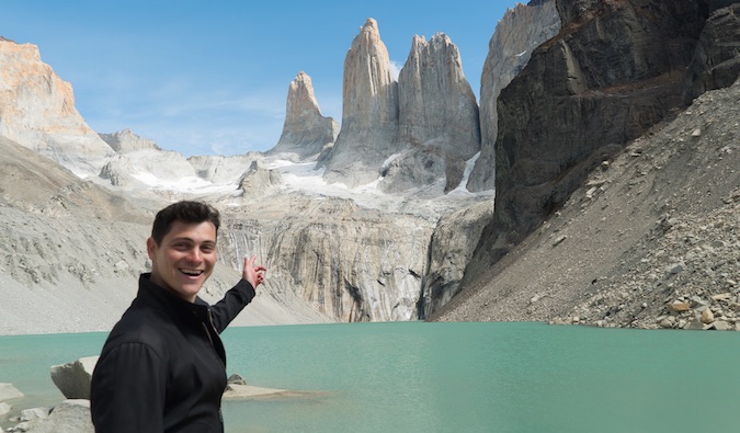 Nomadic Matt overlooking the water and mountains in Patagonia, Chile