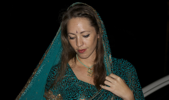 a female traveler in a sari